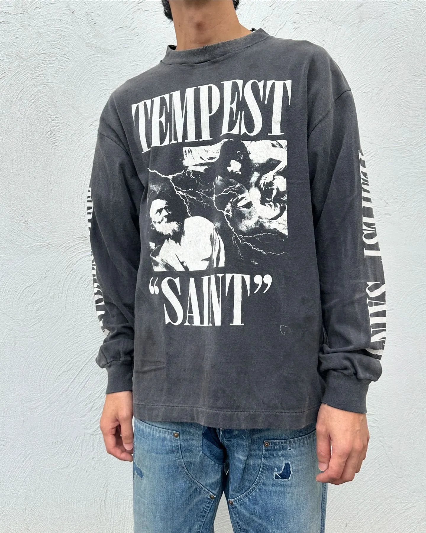 SAINT Mxxxxxx LS TEE/TEMPEST/BLK 'TEMPEST SAINT' Storm Religious Saints Cracked Retro Vulcanized Heavy Wash Long Sleeves Washed Black S-XL Assute Dyeing Multi-bit Horse Fading Craftsmanship Grinding and Hanging Holes Full of Old Feeling Top Printing Craftsmanship Purchasing Level